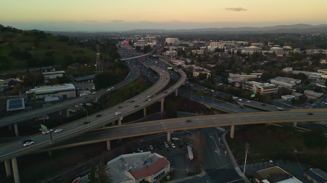 Dusk aerial view of San Francisco freeways and urban sprawl scenery