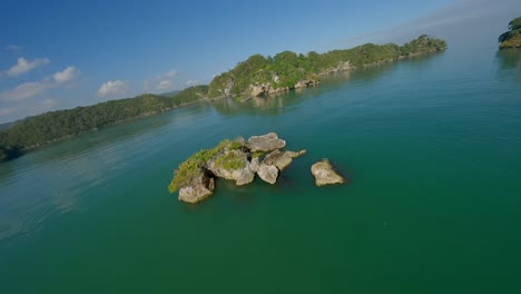 Drone-flying-over-waters-and-mangroves-of-Los-Haitises-National-Park,-Dominican-Republic