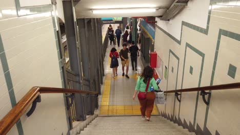 pov walk downstairs in vintage underground metro station of south america