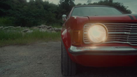 vintage red car in nature setting