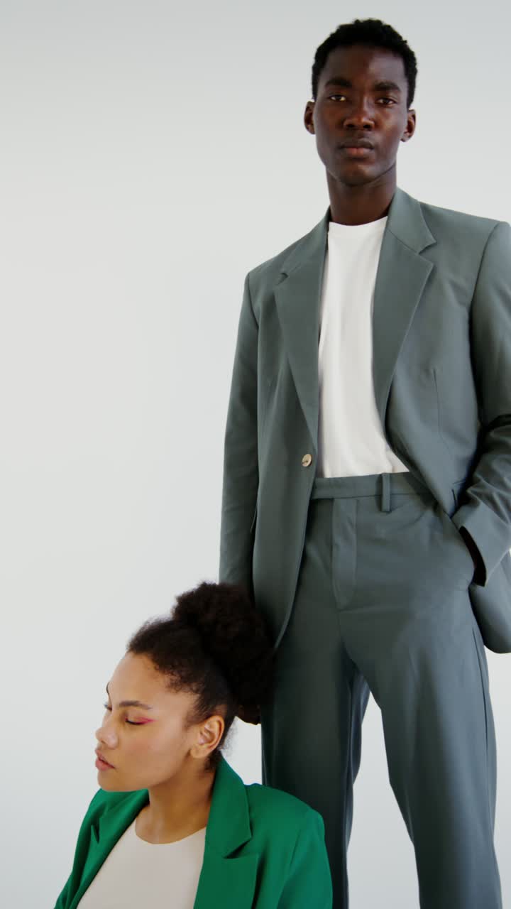 Stylish models in formal suits