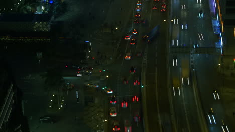 High-Angle-Night-Low-Shutter-Speed-Tilt-Up-Time-Lapse-of-traffic-moving-in-Hong-Kong