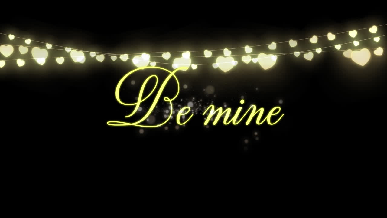 검은 바탕 에 황금색 글자 로 쓰여진 "내 것 이 되라"의 애니메이션