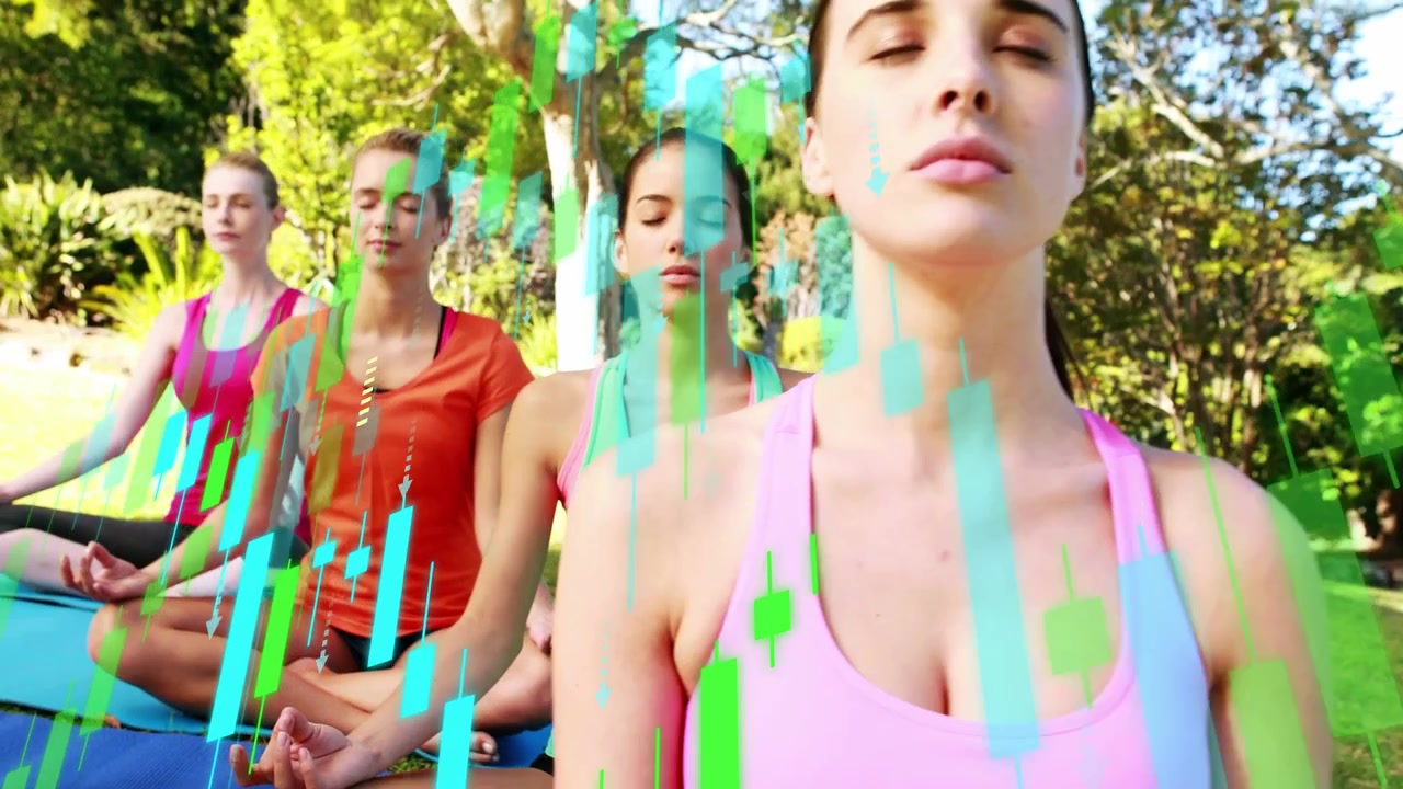 Mujeres meditando al aire libre con superposición de datos digitales