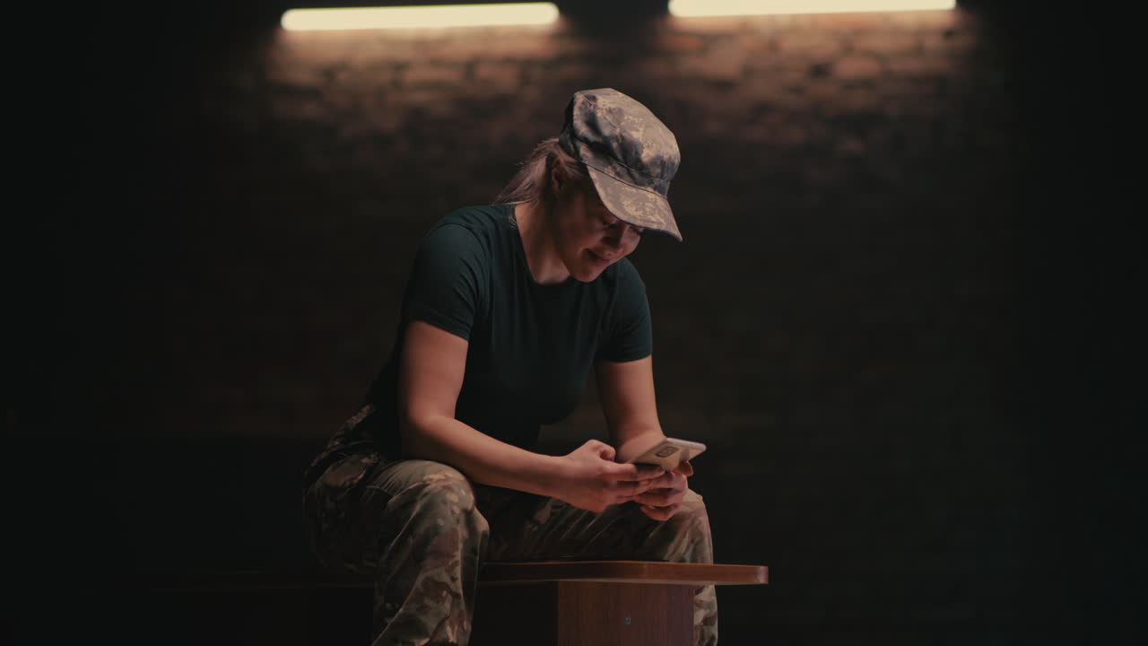 Military Woman using Phone