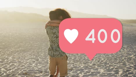 Heart-icon-with-increasing-numbers-against-african-american-couple-hugging-each-other-on-the-beach