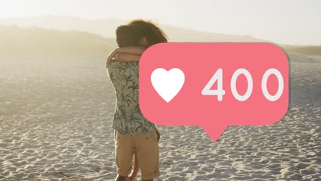 icono del corazón con números crecientes contra una pareja afroamericana abrazándose en la playa