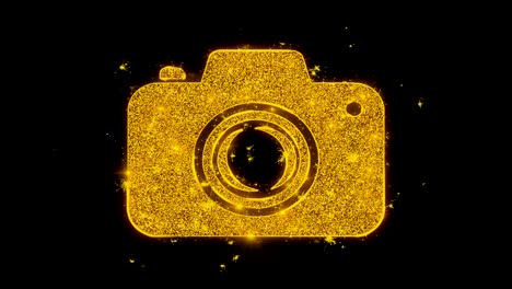 camera photography icon sparks particles on black background.