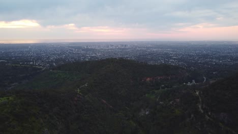 A-great-view-of-Greater-Adelaide-appearing-from-behind-a-large-hill-shot-at-twilight