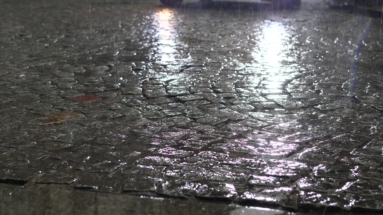 Rainy Night on Cobblestone Street