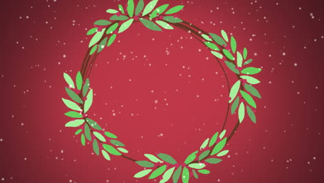 animation of christmas decoration with copy space and snow falling on red background