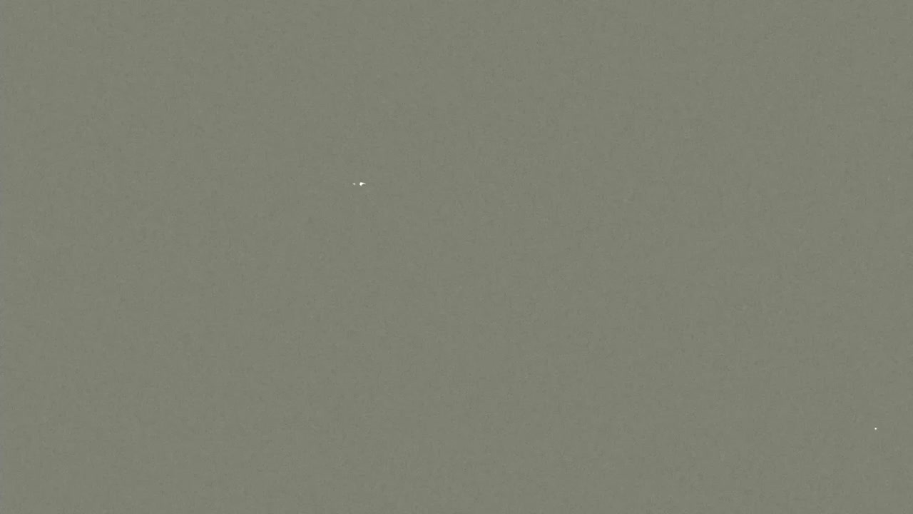 Fondo gris sólido con textura sutil de grano de película