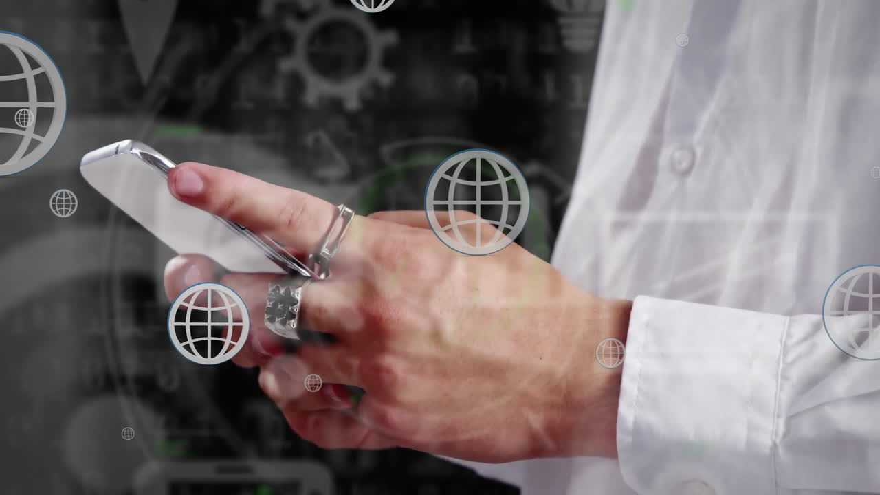 animación de globos y múltiples iconos sobre la sección media del hombre caucásico usando un teléfono inteligente