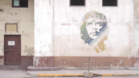 che guevara mural on an urban building wall