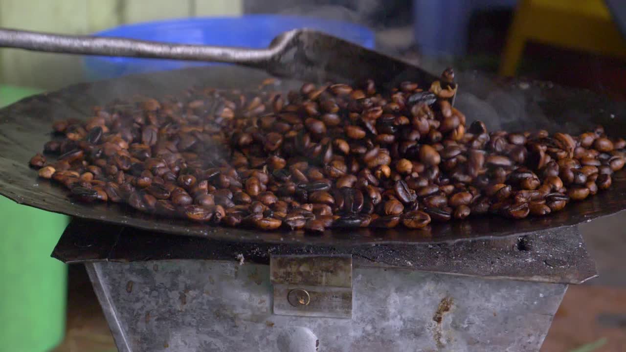 Side shot for the coffee beans being roasted and turned into the dark color, this is sign they are ready to be turned into delicious drink