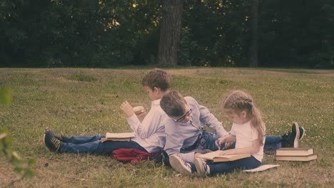 relaxing-schoolboys-wearing-shirts-sit-near-writing-girl