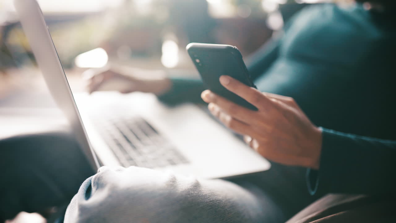 a woman holding her cellphone