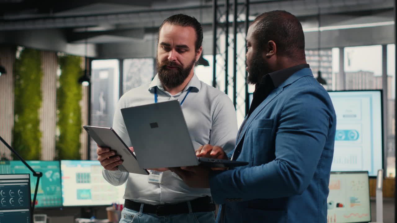 Vertical Video Business associates collaborating on a project with data insights