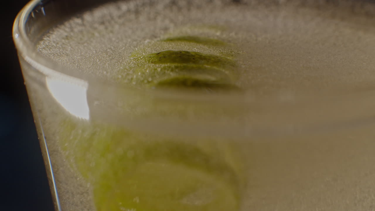 Close-up of a refreshing cocktail with lime