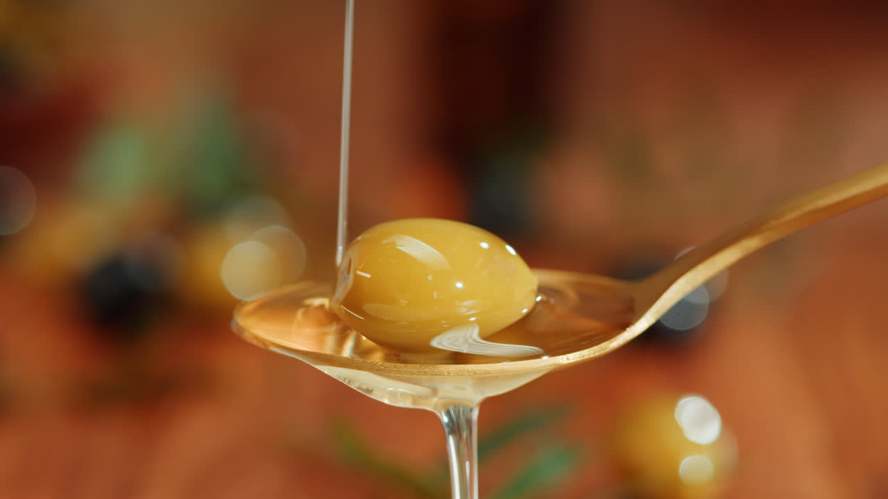 Olive Oil Drizzled on Olive