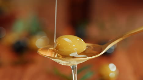 olive oil drizzled on olive