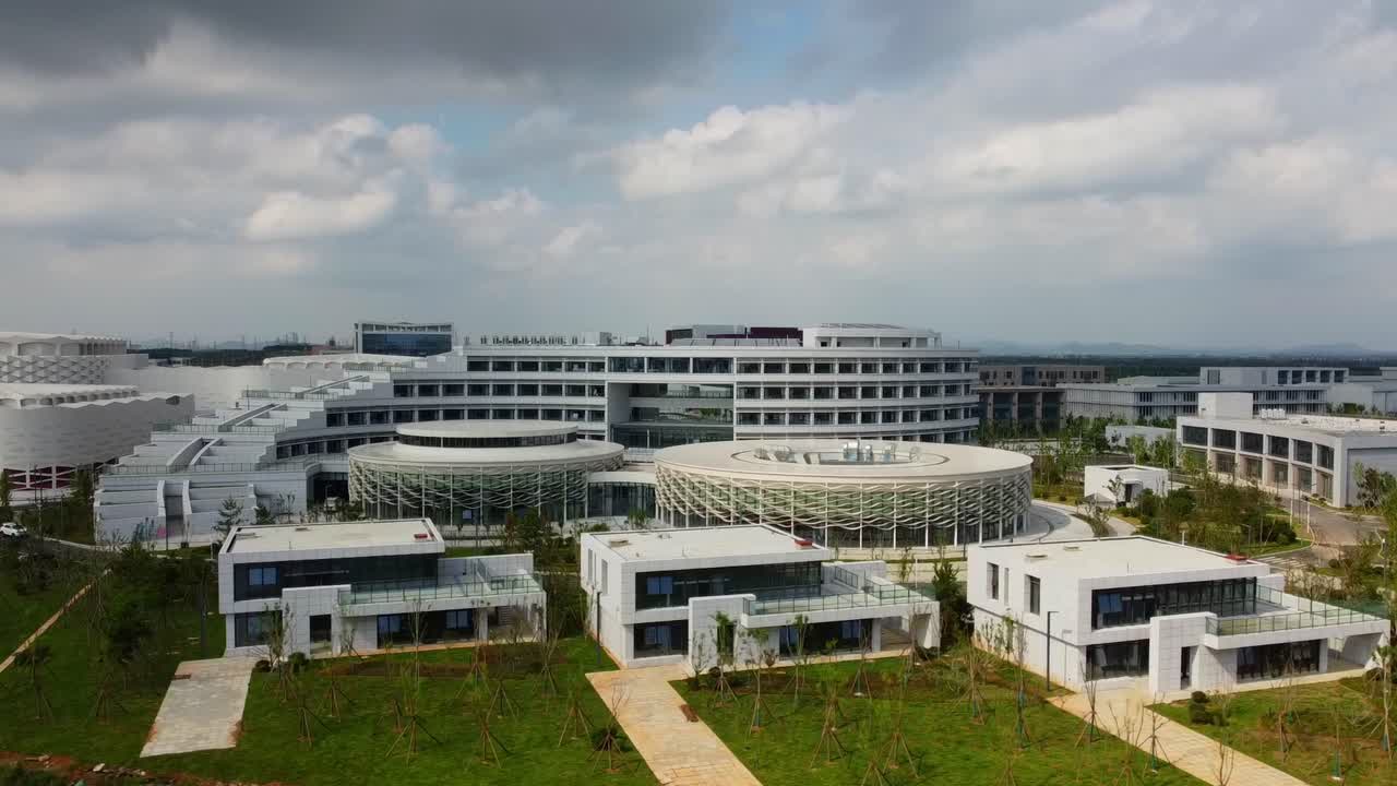 Weihai olympic center hotel building aerial sliding closeup view