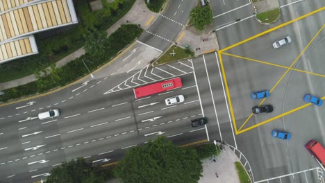 aerial view of city street intersection with traffic