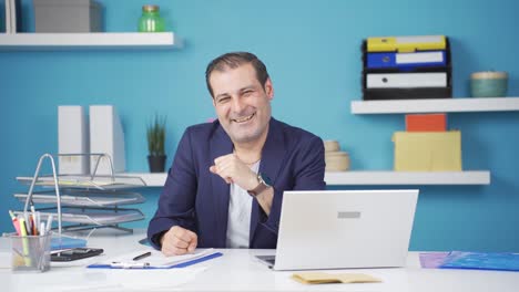 Cheerful-and-caring-businessman-looking-at-camera.