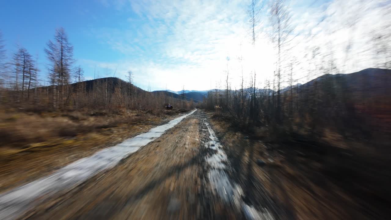 Experience the awe of Yakutia's unspoiled nature as a drone glides over impressive terrain, revealing stunning natural beauty and the tranquility of the Siberian wilderness.
