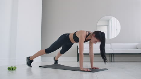 the plank exercise on tiptoes which gives the girl great calves