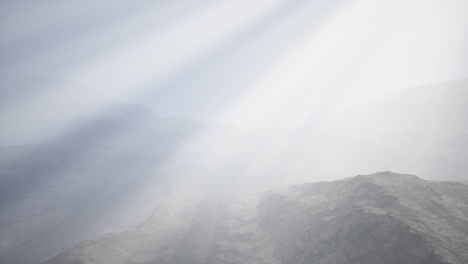 Sun-Rays-against-the-Backdrop-of-the-Mountains