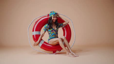 Girl in Swimsuit and Life Preserver