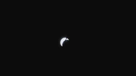 partial solar eclipse captured at night in little rock, arkansas