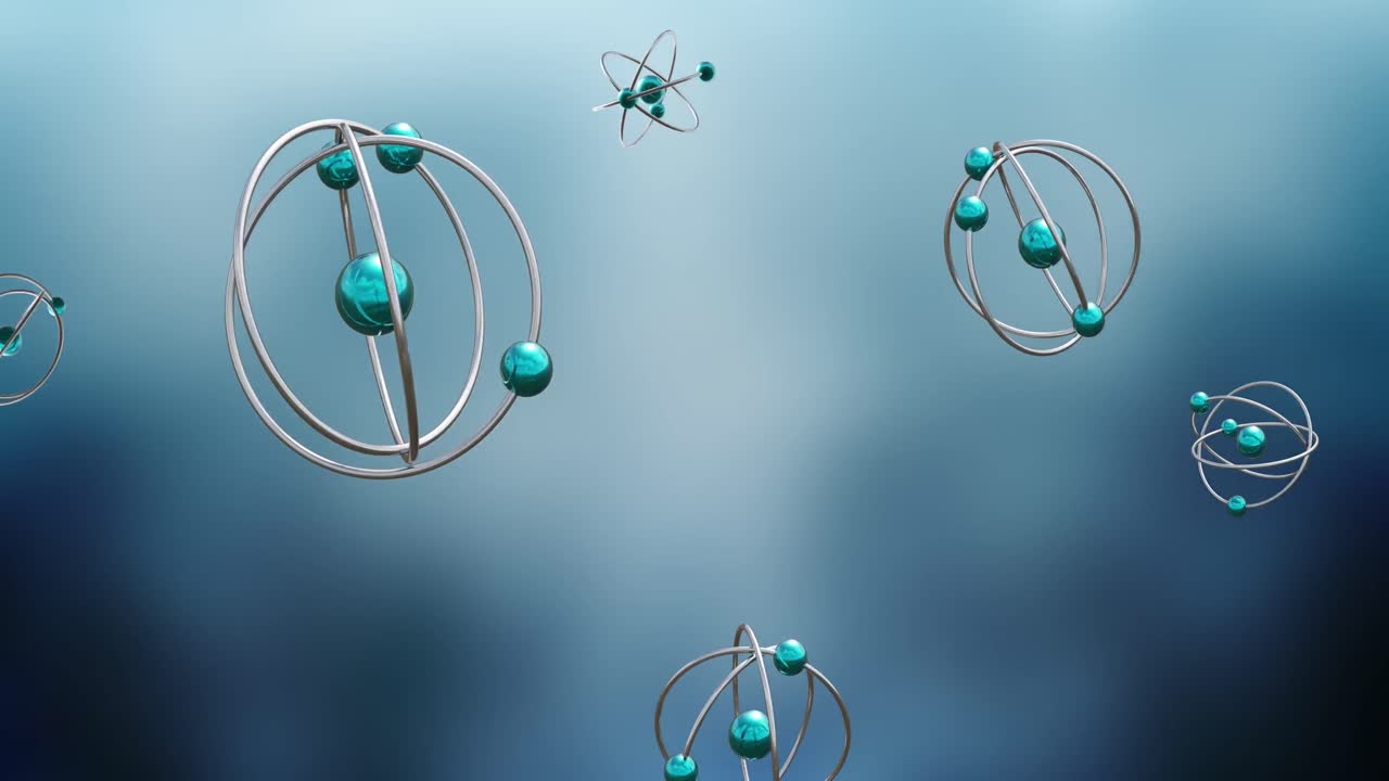 Animation of atom models spinning on blue background