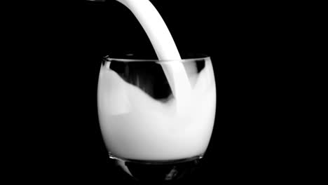 milk in super slow motion being poured