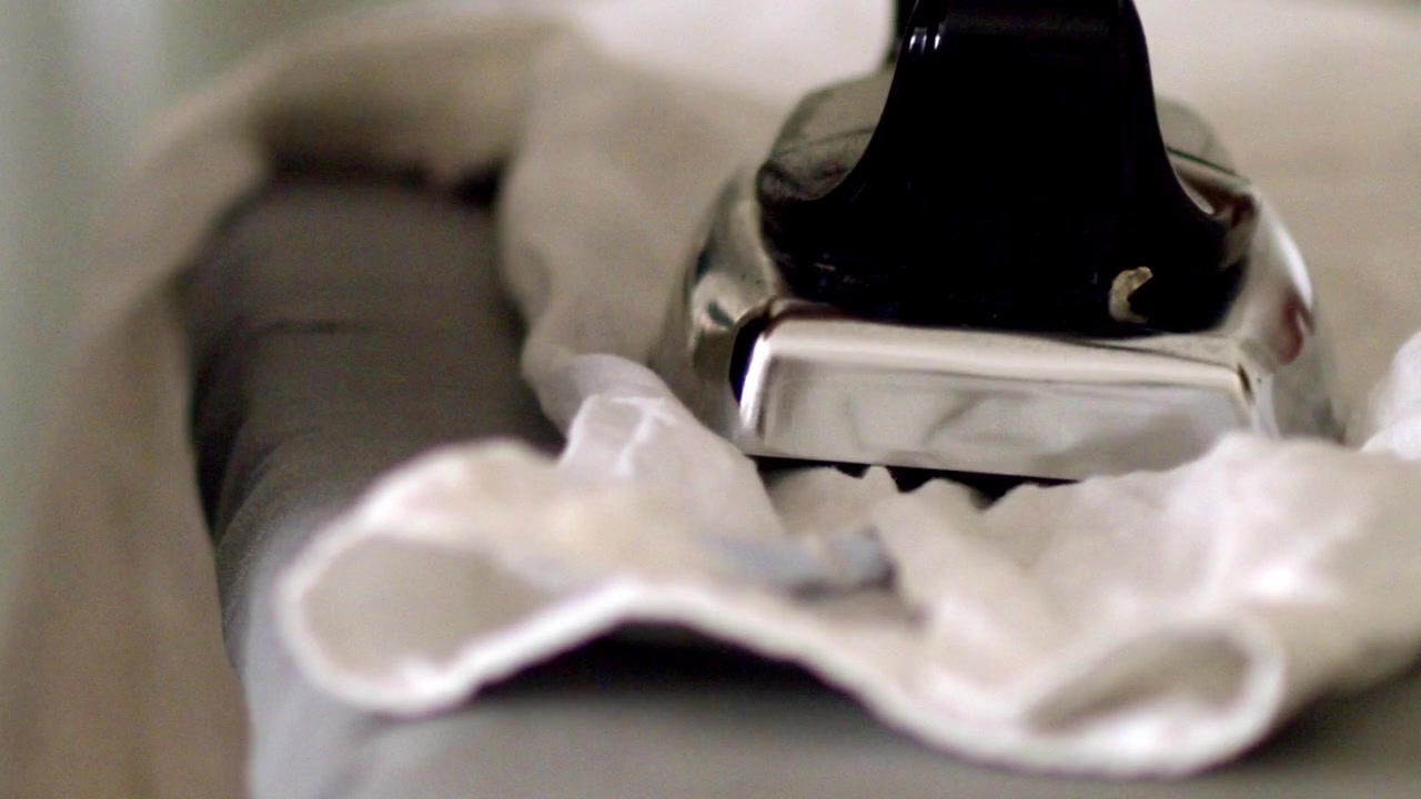 White Shirt sleeves, hot electrical appliances, household routine task
