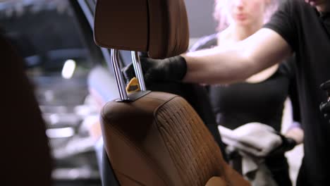 process of applying a ceramic coating to the leather interior of a car, providing protection and enhancing its appearance.