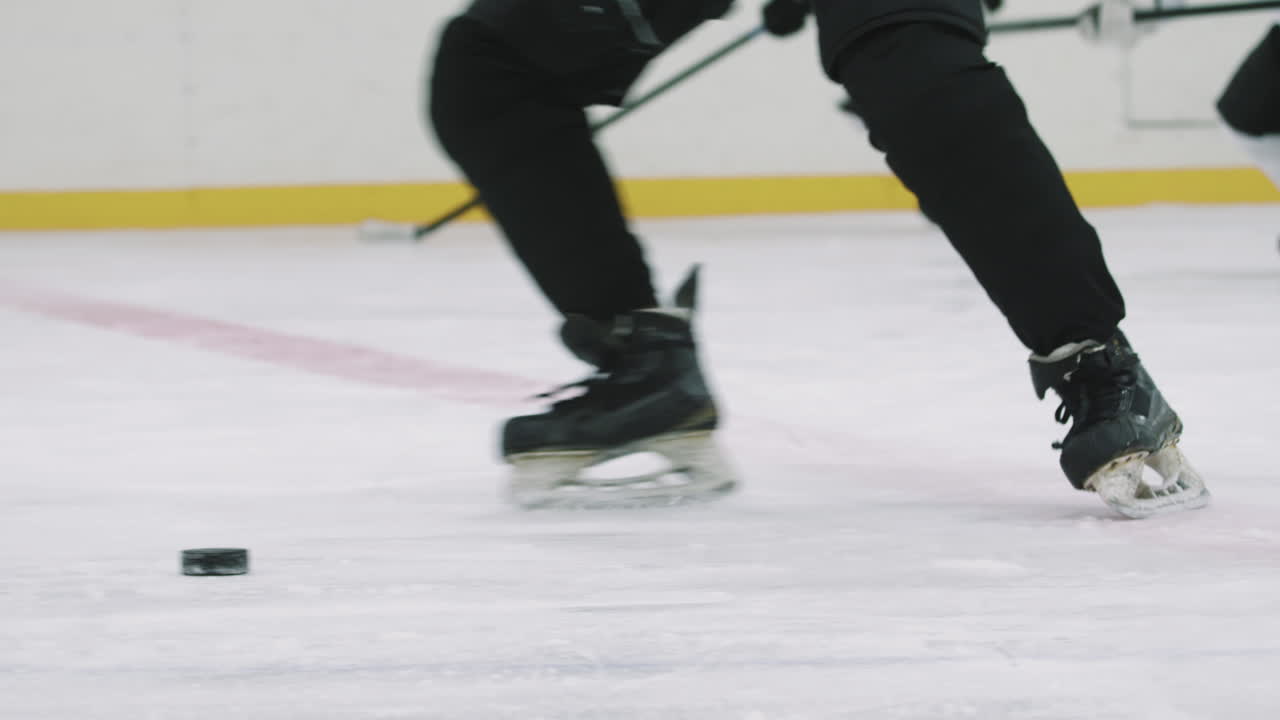 Hockey Players Skating On Ice