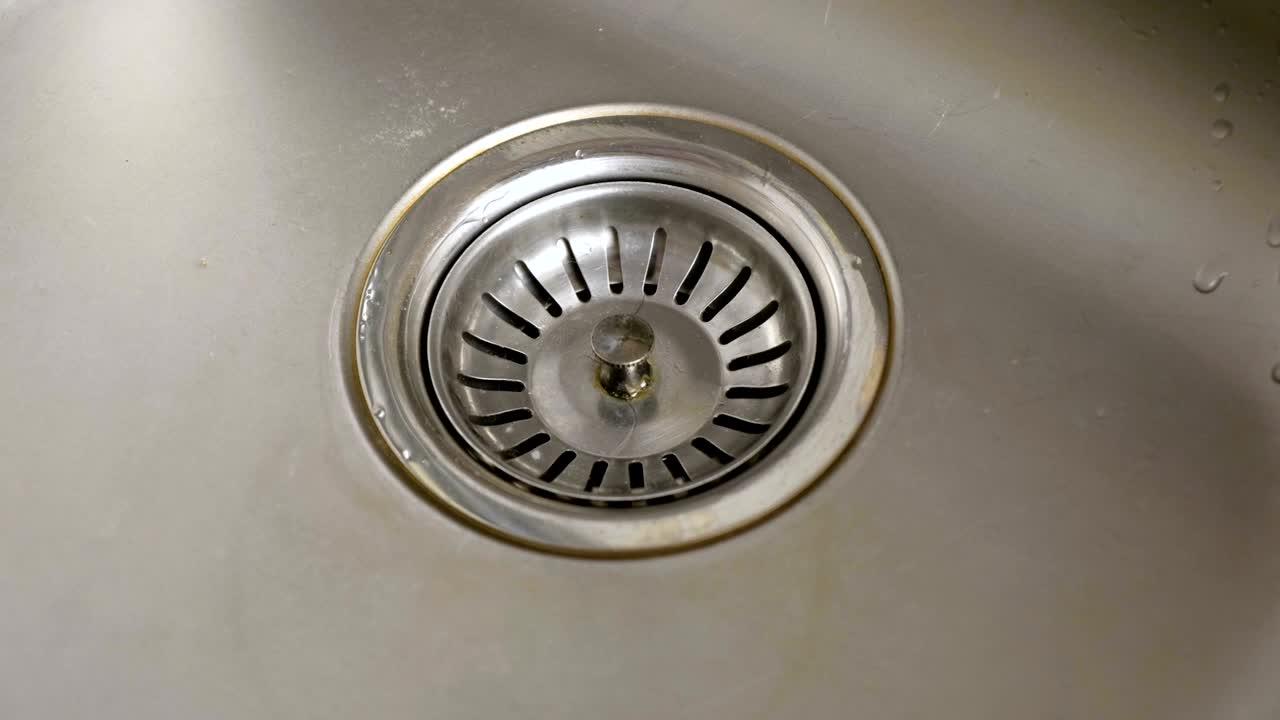 Stainless steel kitchen sink hole drain.