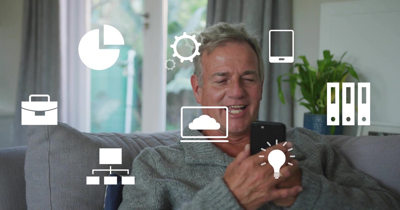 Senior male tapping smartphone and showcasing animated business icons then raising handset for call