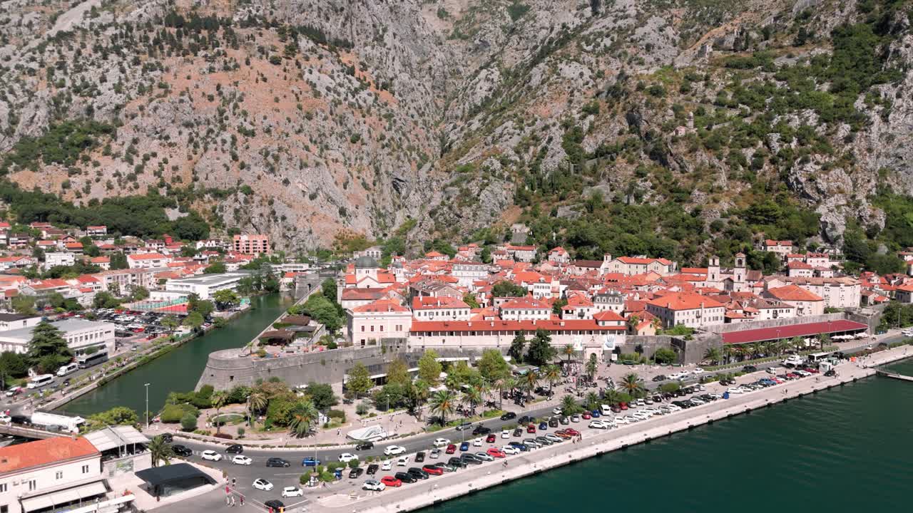 Aerial around the city walls of Kotor in Montenegro as part of the the fortress near the port medievil military structure