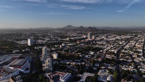 aerial view of the culiacán rosales city, sunny day in northwestern mexico - tracking, drone shot