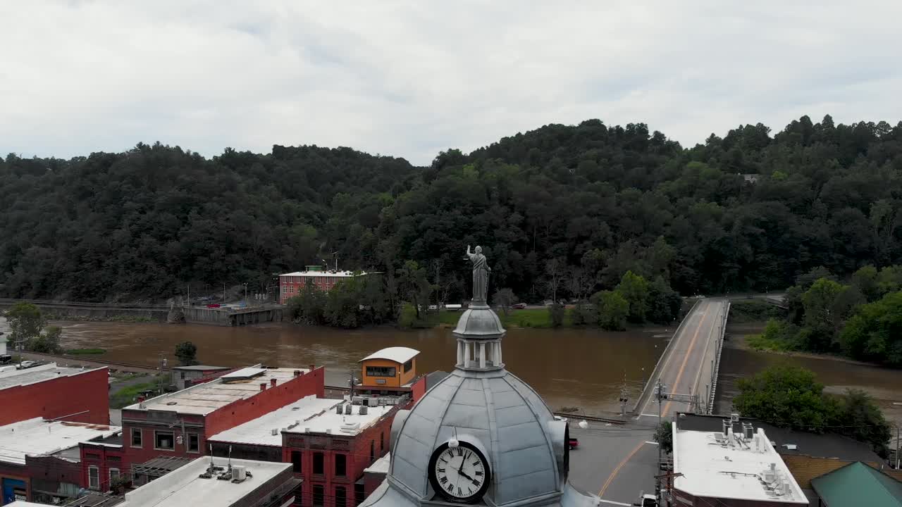 Aerial View of a Flooded Town with a Clock Tower
