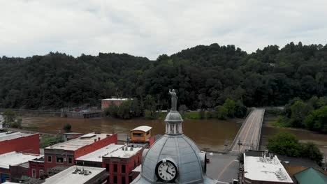 Aerial View of a Flooded Town with a Clock Tower
