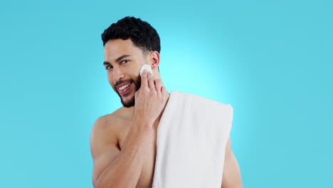 Face,-skincare-and-man-with-cotton-in-studio