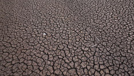 first-person view walking on cracked and destroyed soil by erosion