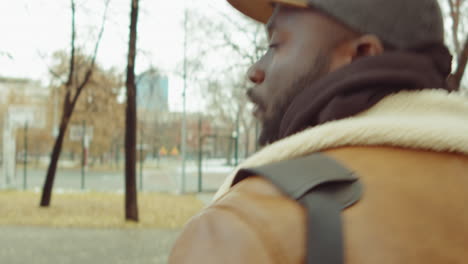 african american man walking outdoors