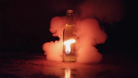 bottle with internal flame amidst red smoke