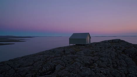coastal cabin at sunset