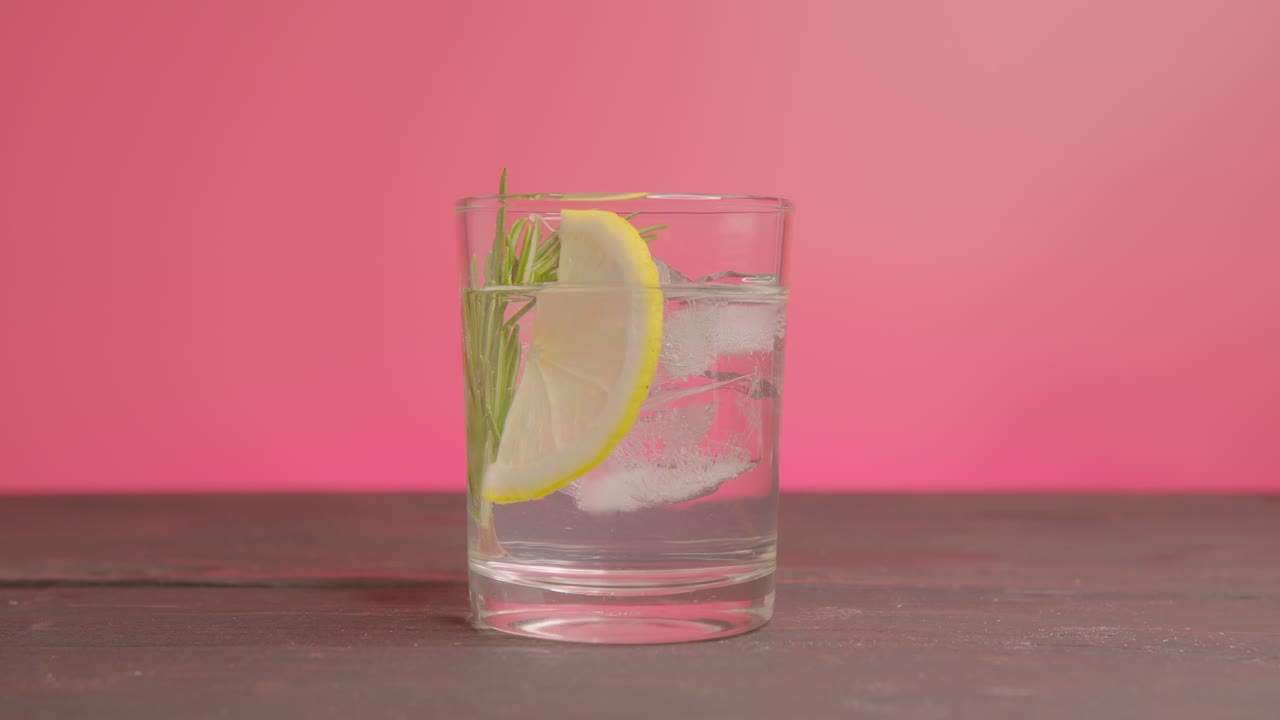 Refreshing Gin and Tonic with Rosemary and Lemon